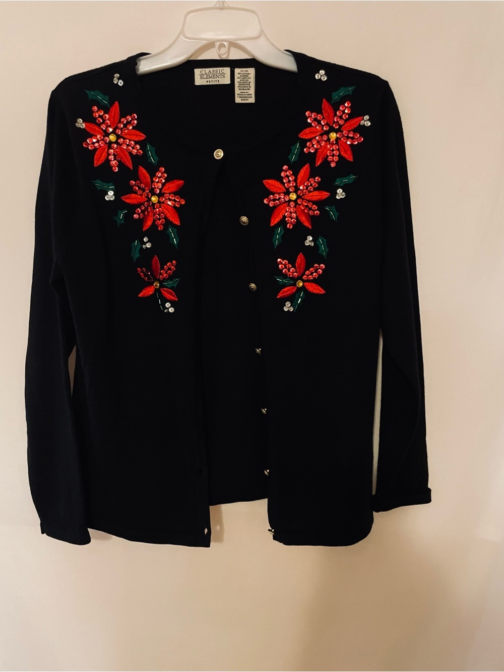 Classic Elements Black Cardigan with Red Poinsettia Embellishment